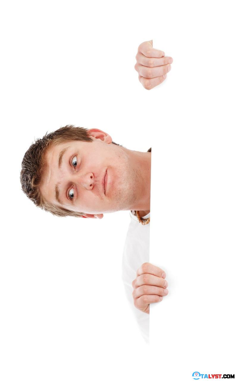 Man looking above a billboard