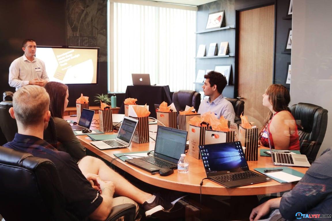 People around table at a meeting