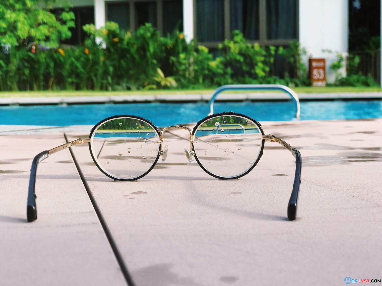 Sunglasses by the hotel pool