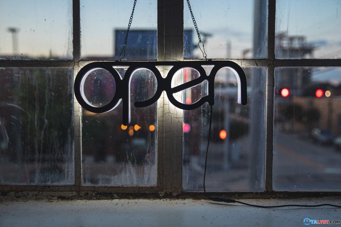 Open sign on a window